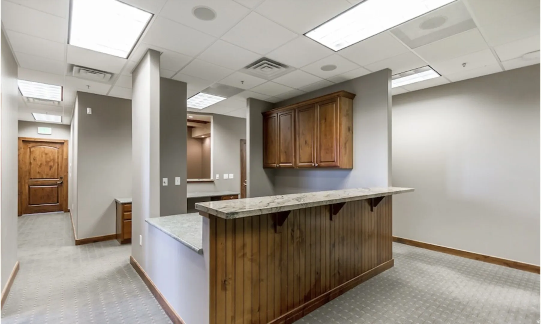 Reception area with a paneled ceiling
