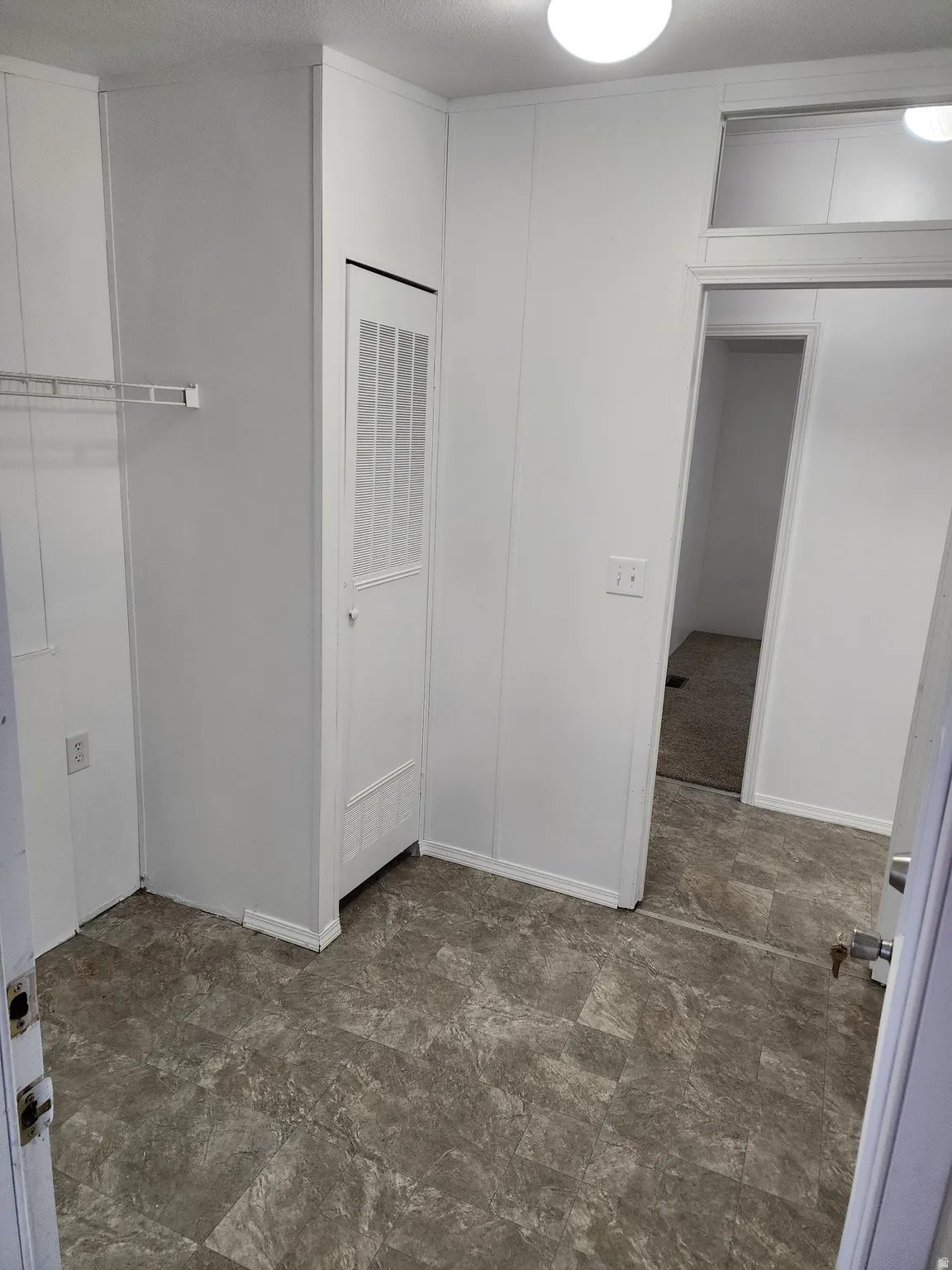 Closet featuring a heating unit