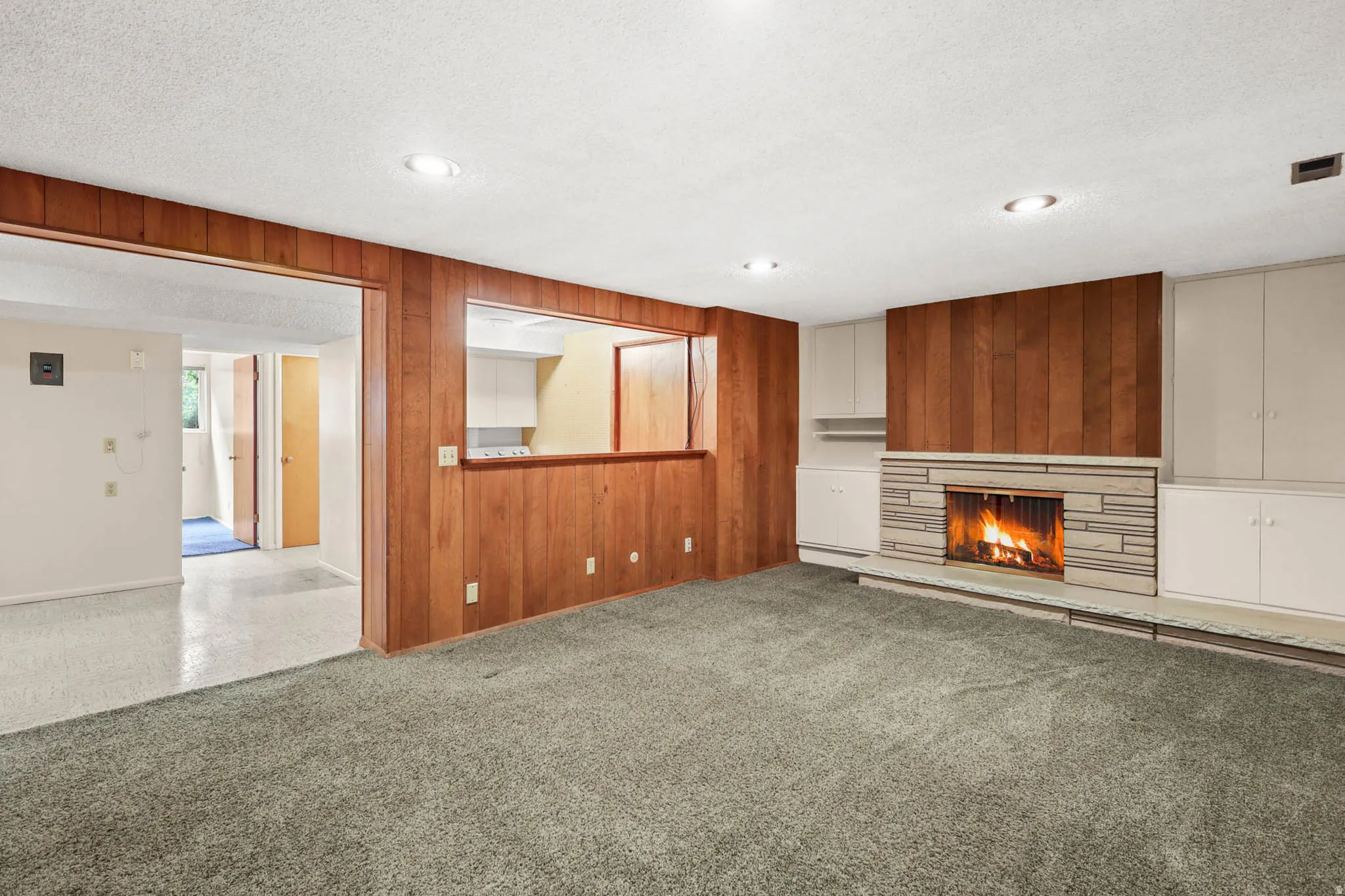 Large downstairs family room with fireplace