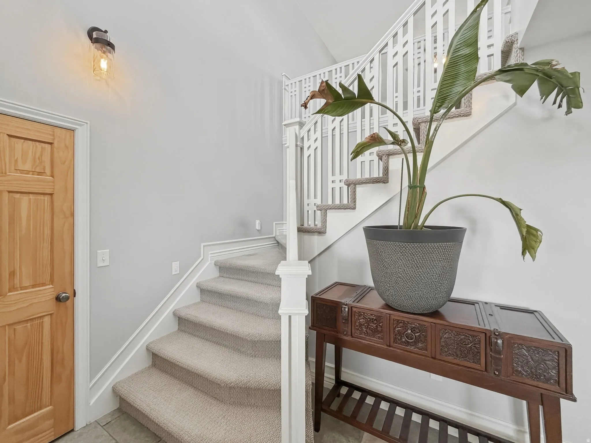 Stairway with tile patterned floors