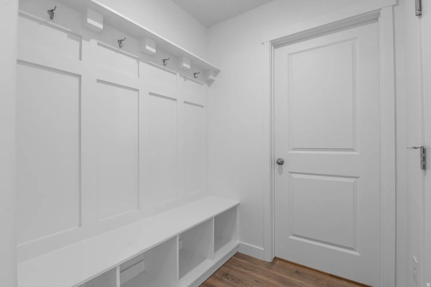 Mudroom with dark wood-type flooring