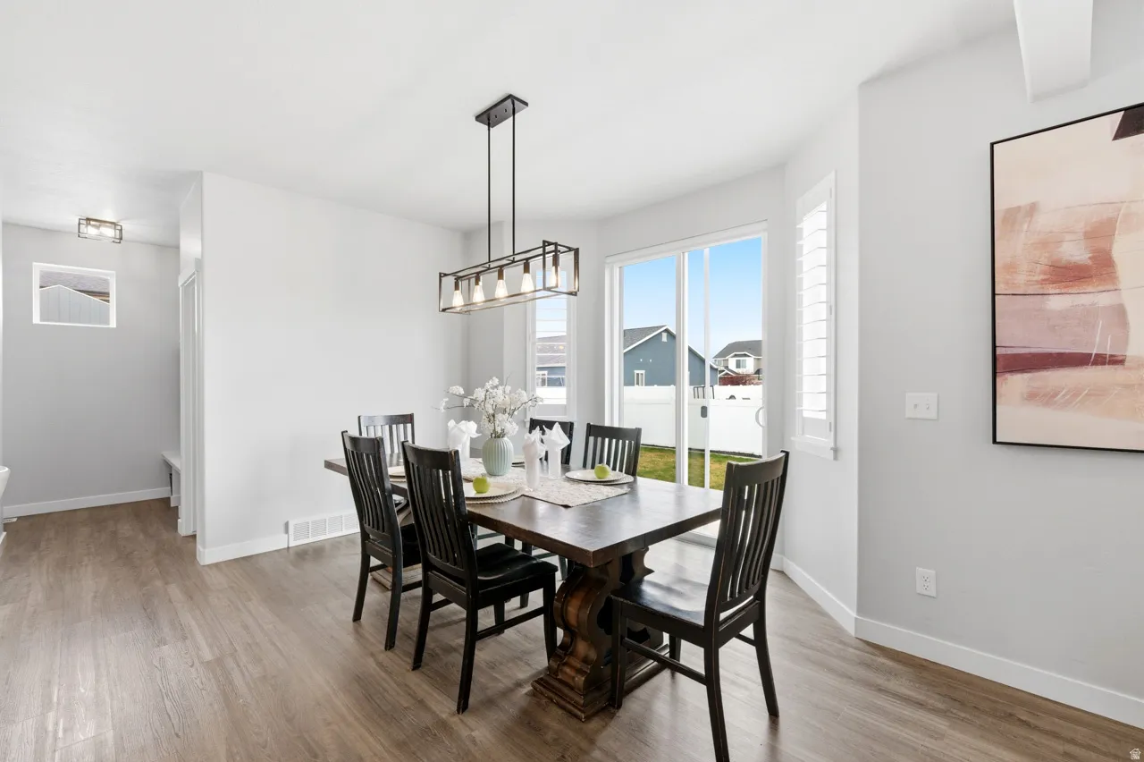 Dining space featuring light wood-style floors
