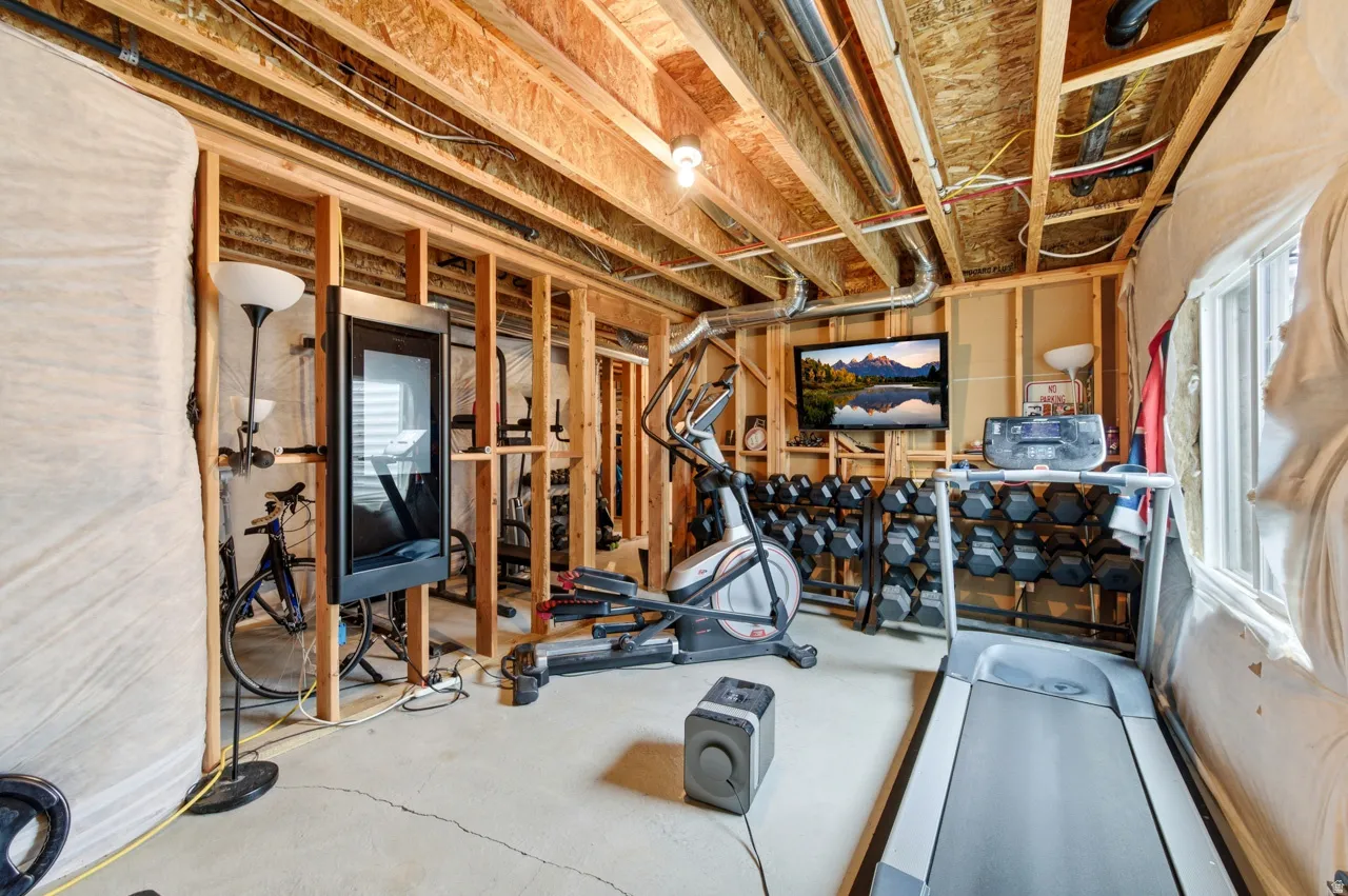 Exercise room with concrete flooring