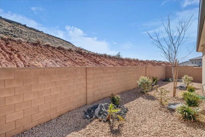 View of fenced backyard