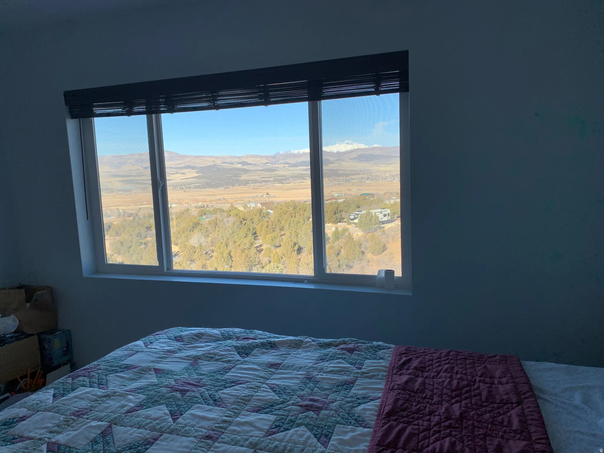 Bedroom featuring a mountain view