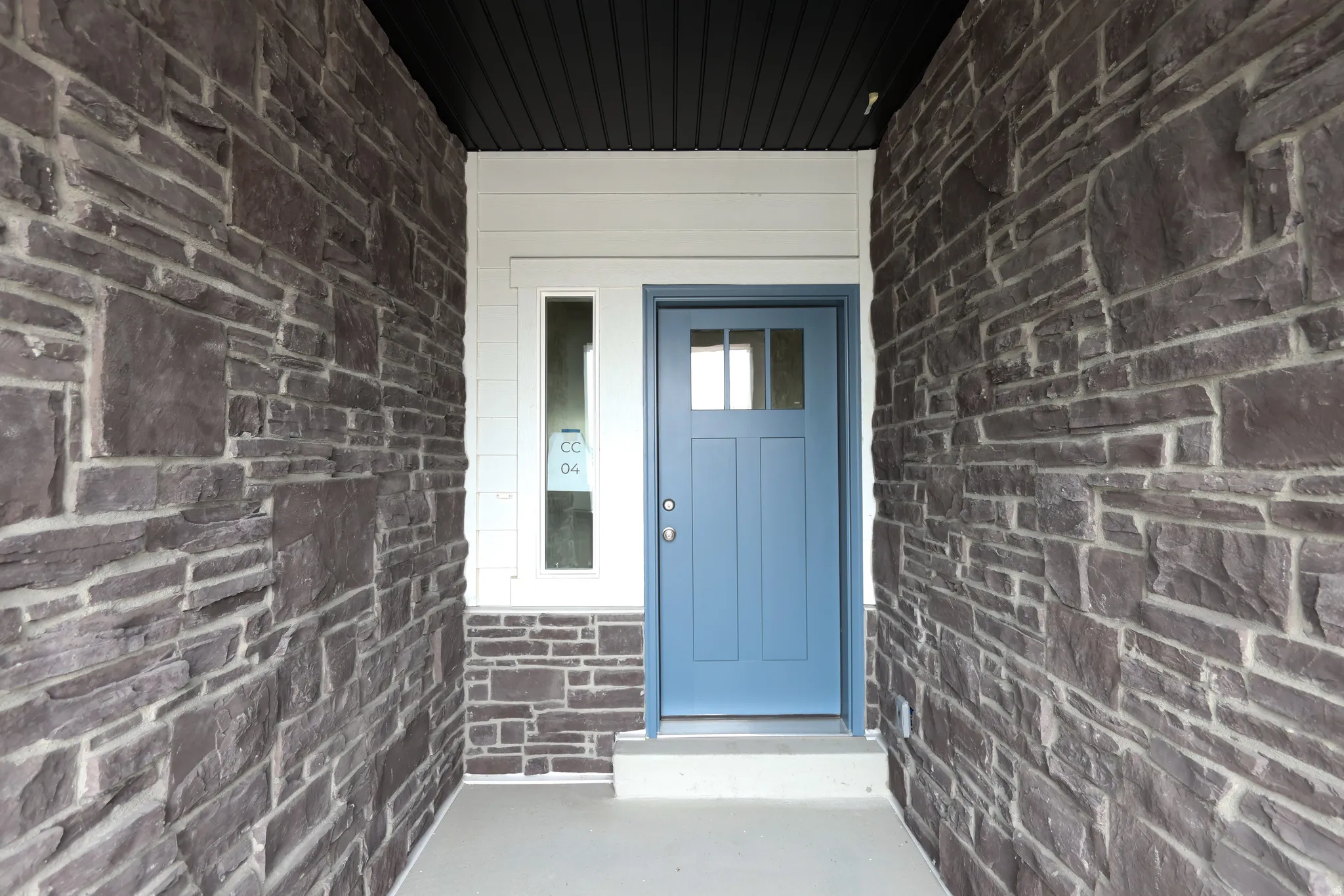 Property entrance featuring a porch