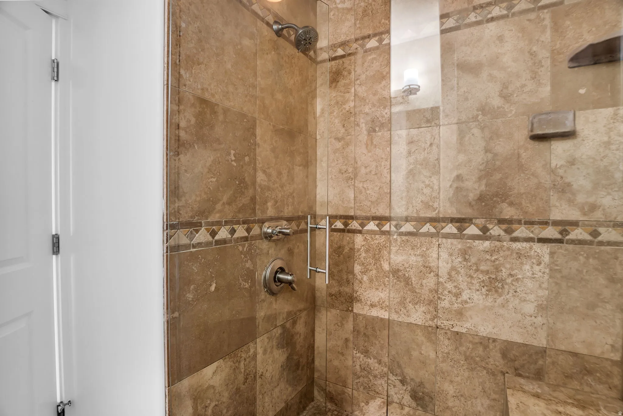 Bathroom with a tile shower