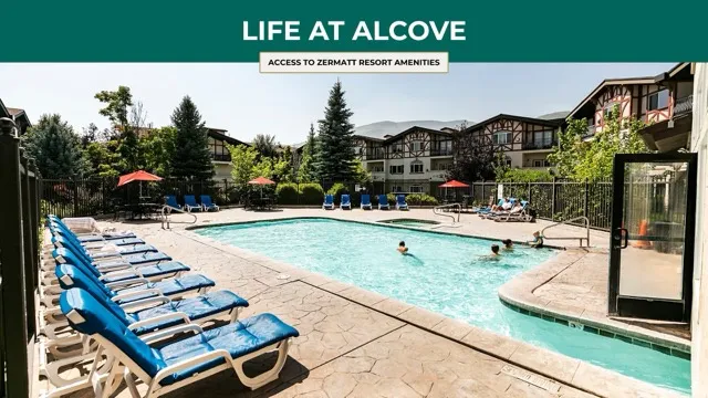 Community pool featuring a patio
