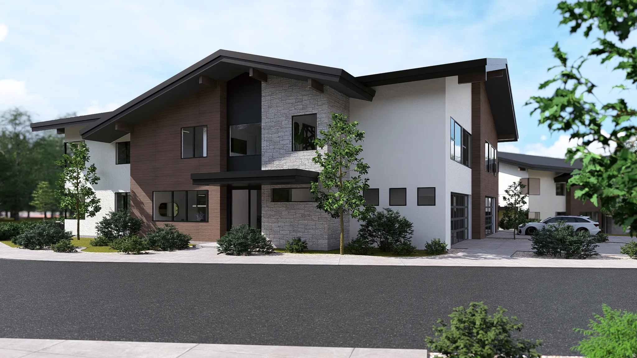 Contemporary house featuring stone siding and stucco siding