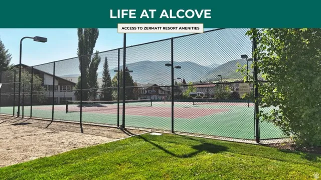 View of tennis court featuring a mountain view