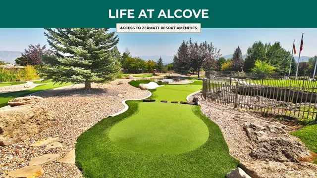 View of property's community with an area to practice putting