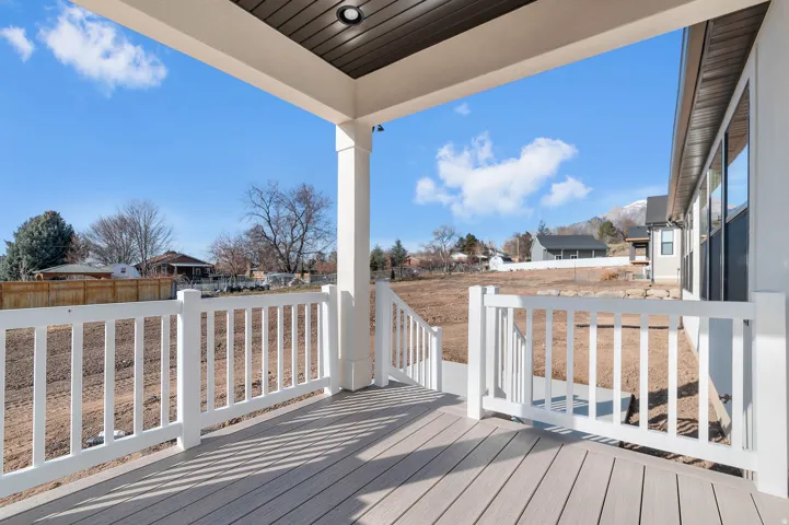 Wooden deck featuring a residential view