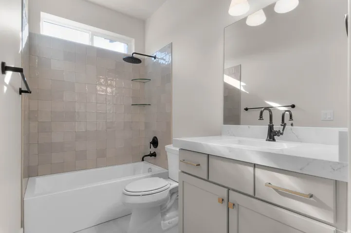 Full bathroom with vanity and tub / shower combination