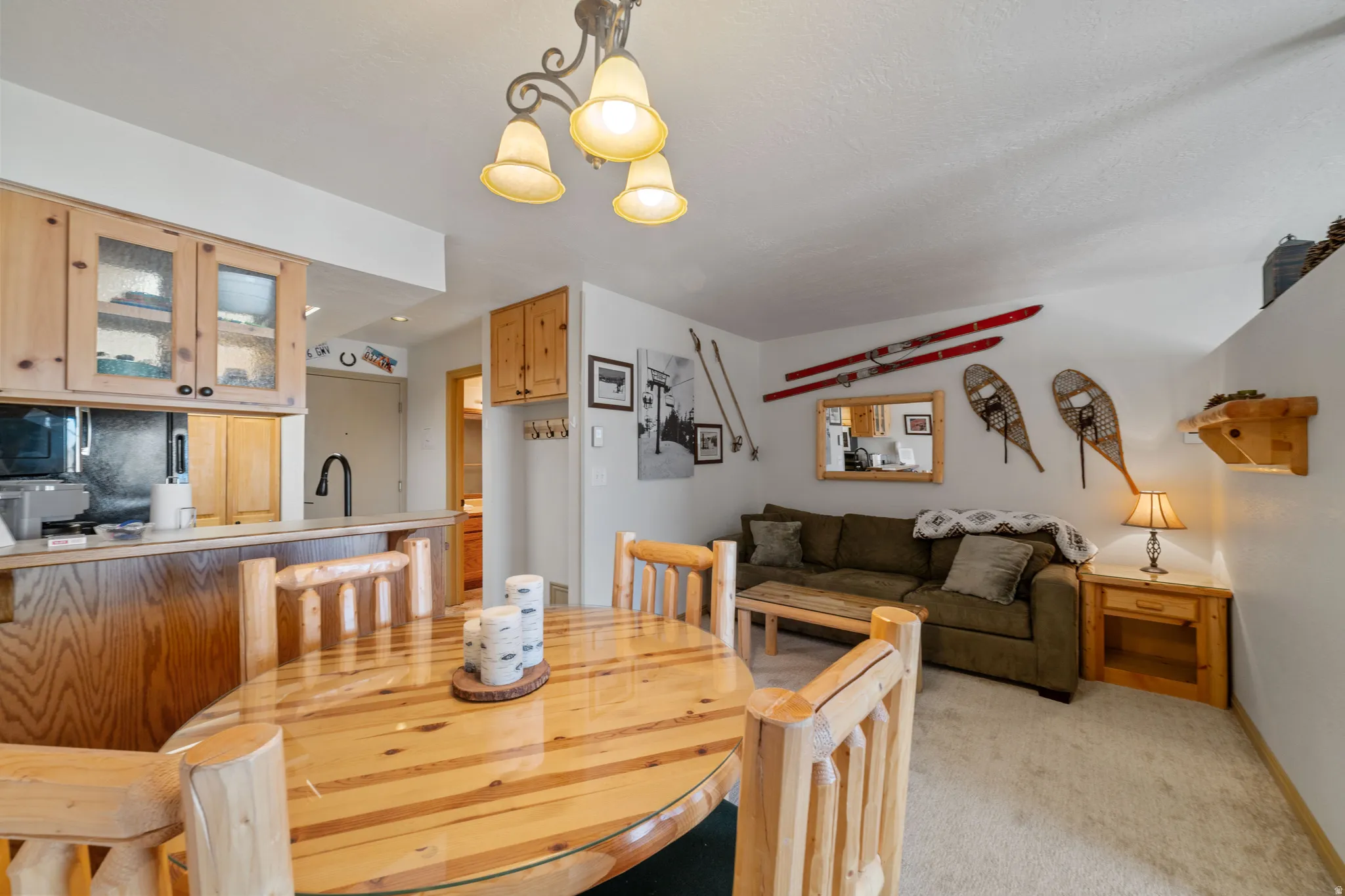 Dining room featuring light carpet