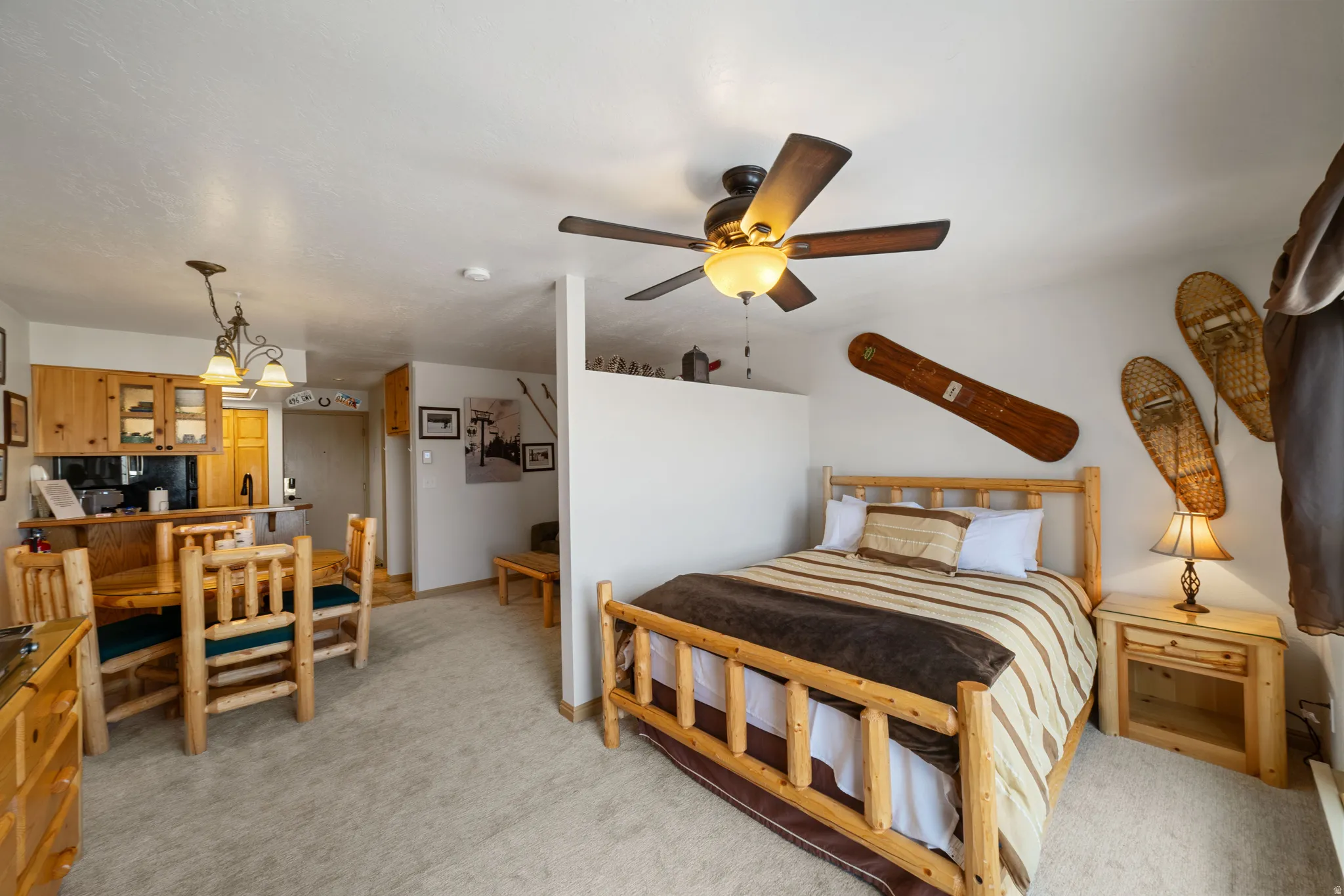 Bedroom with light colored carpet