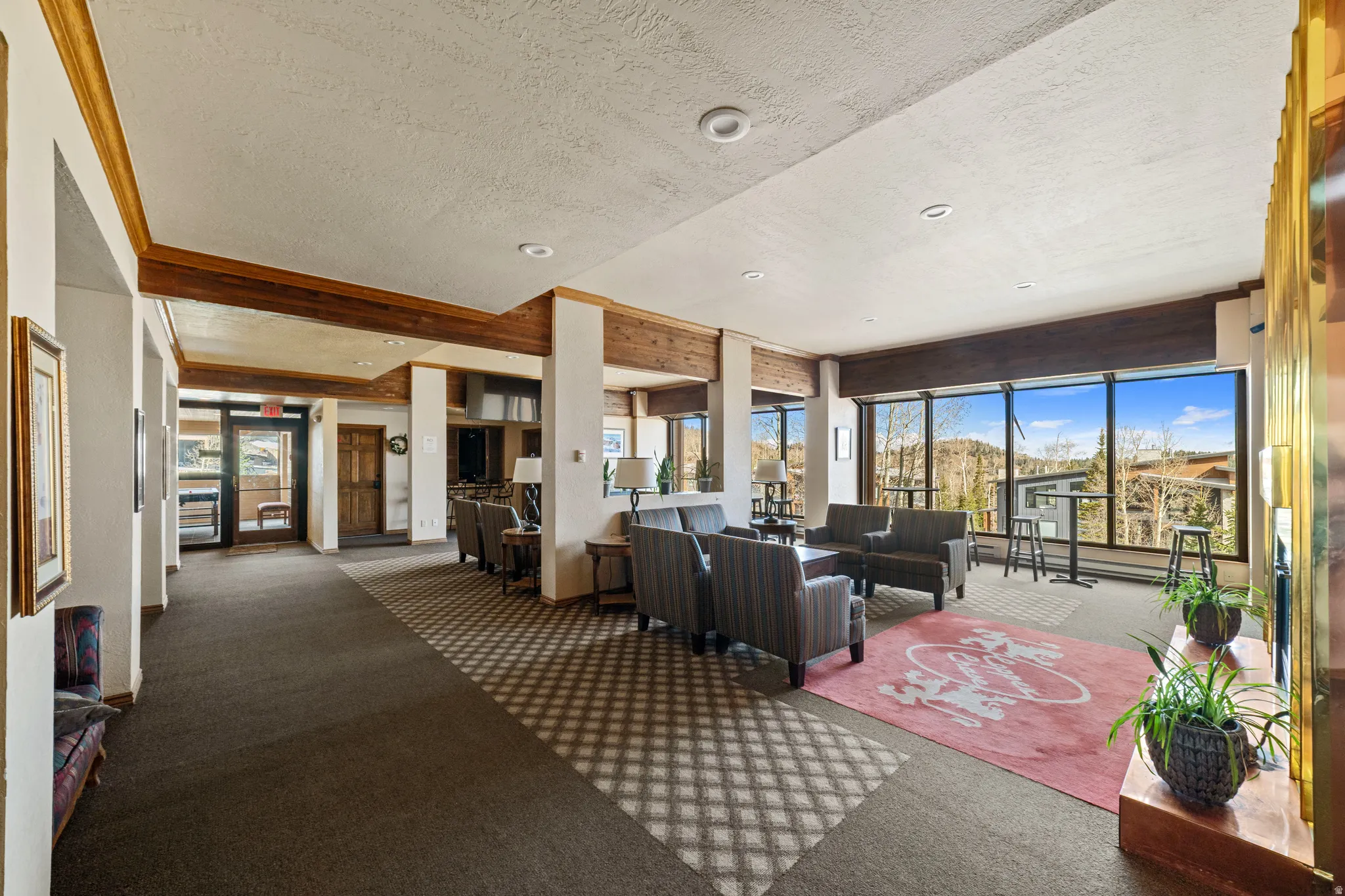 Lobby featuring a textured ceiling and recessed lighting