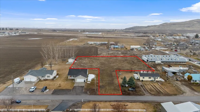 Aerial overview of property's location with property parcel outlined