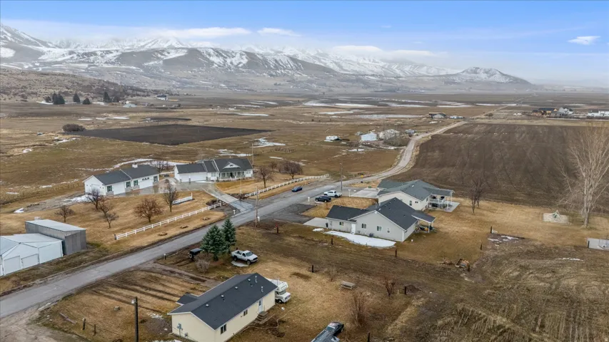 Overview of rural landscape with a mountain backdrop