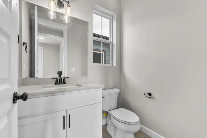 Bathroom with vanity and toilet