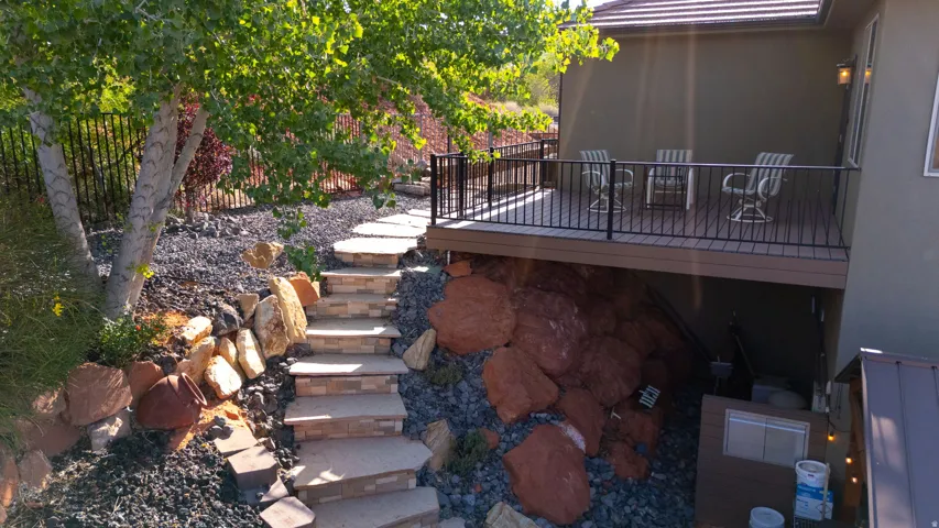 View of yard with a wooden deck