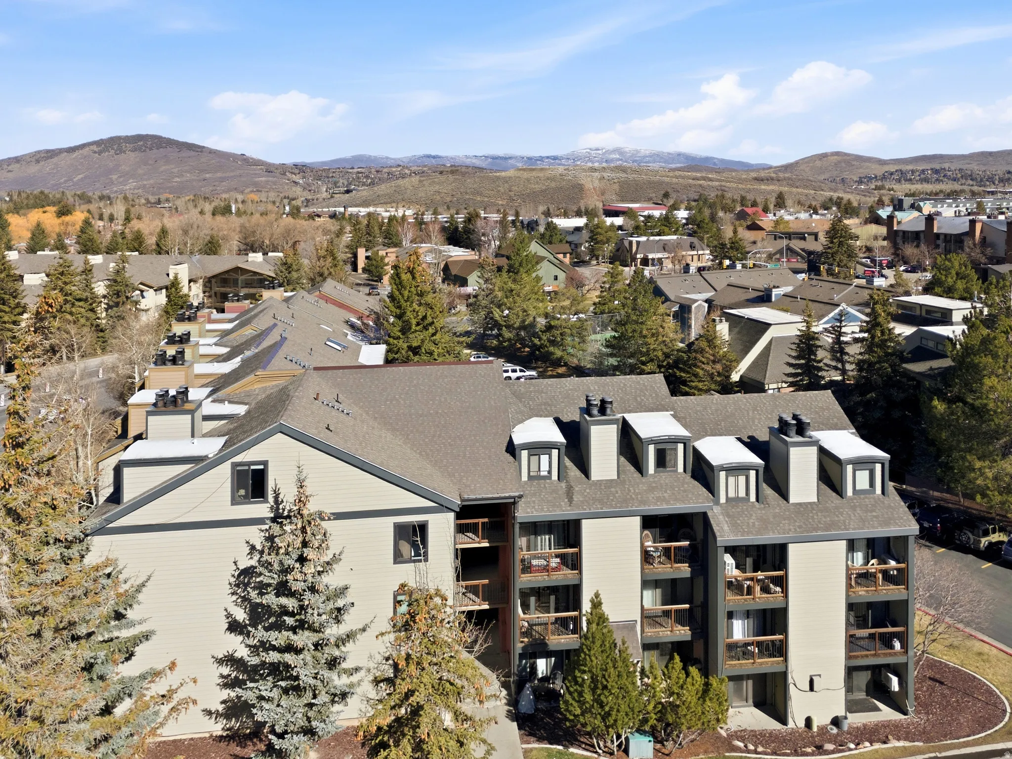 Aerial view of residential area with mountains