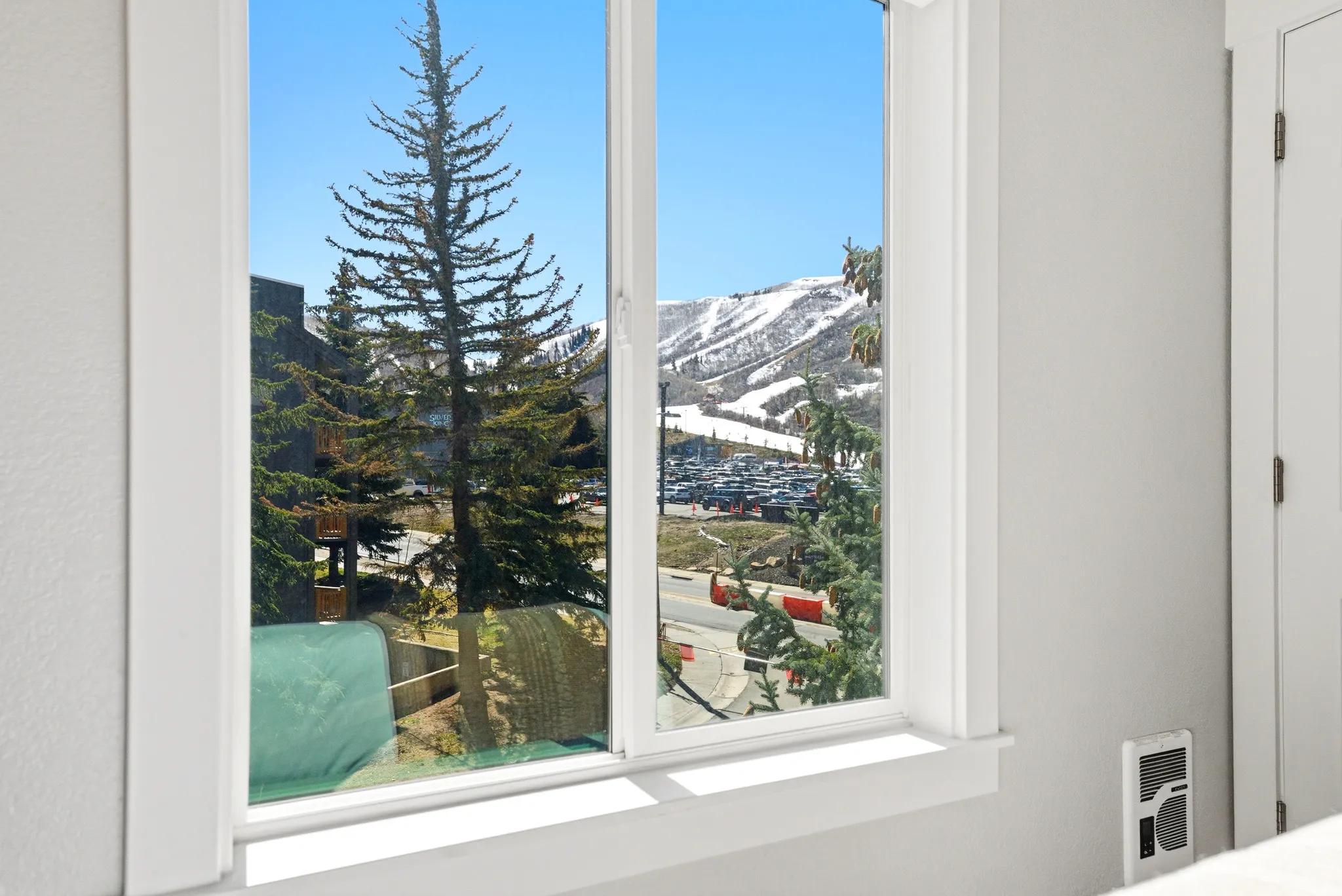 Detailed view of heating unit and a mountainous background