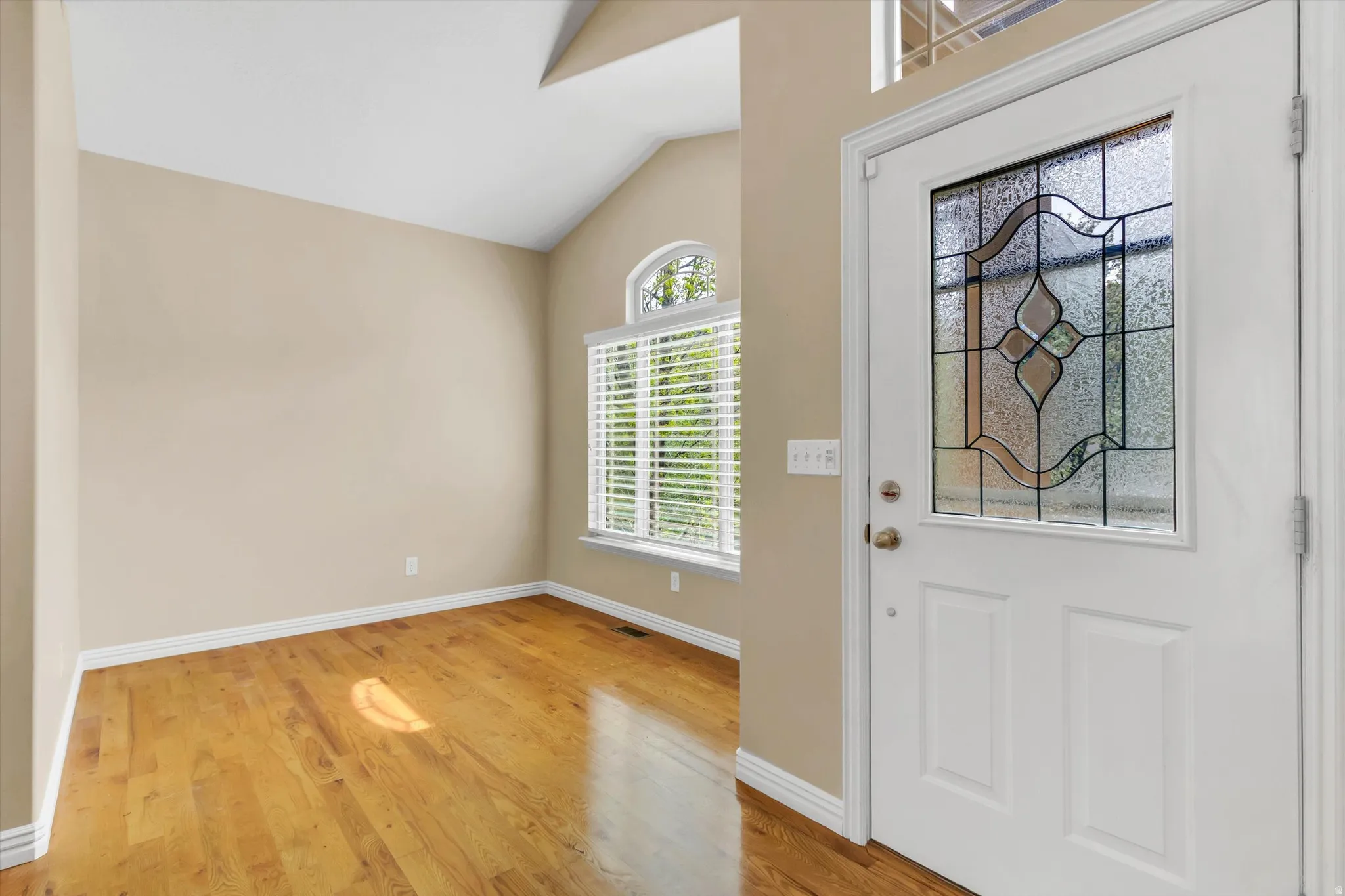 Living Room, Vaulted Ceiling & Lots of Natural Light