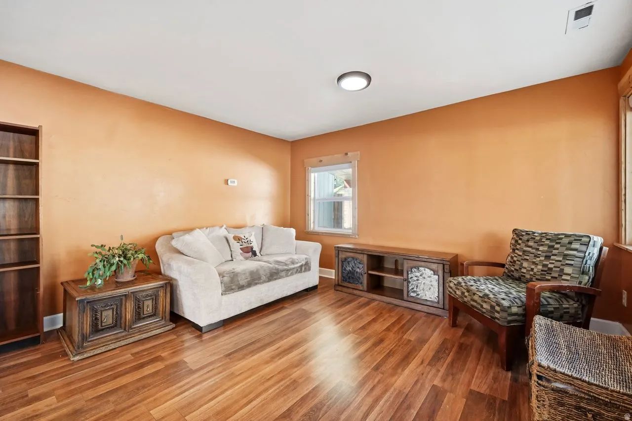 Living room featuring wood finished floors