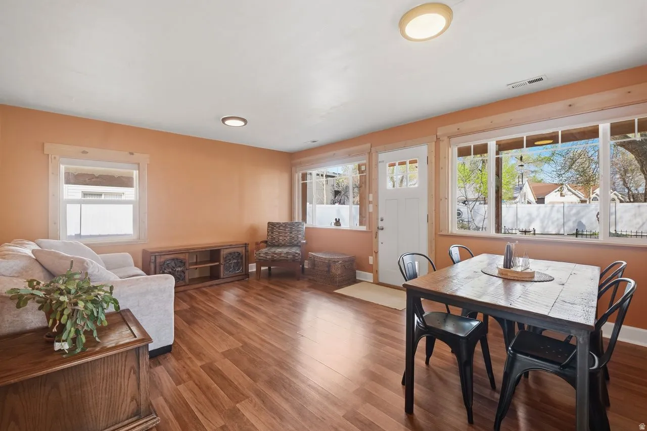 Dining room featuring wood finished floors and baseboards