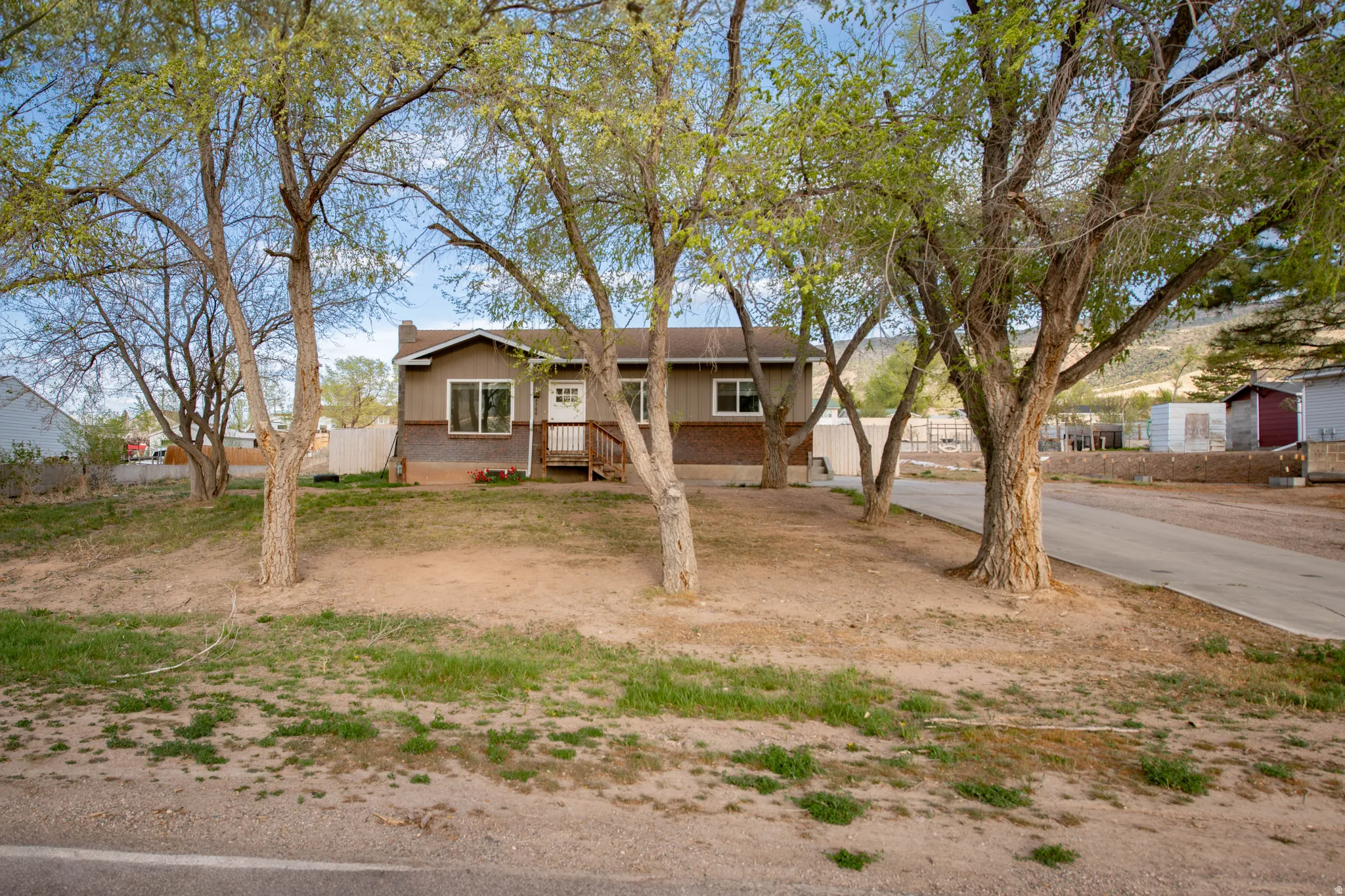View of front of house with brick siding