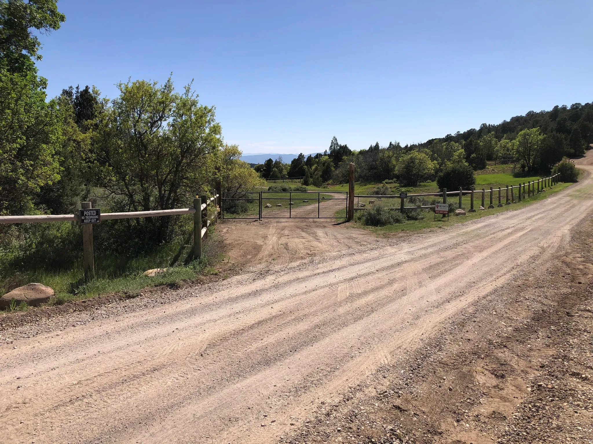 View of street with a gate and a rural view