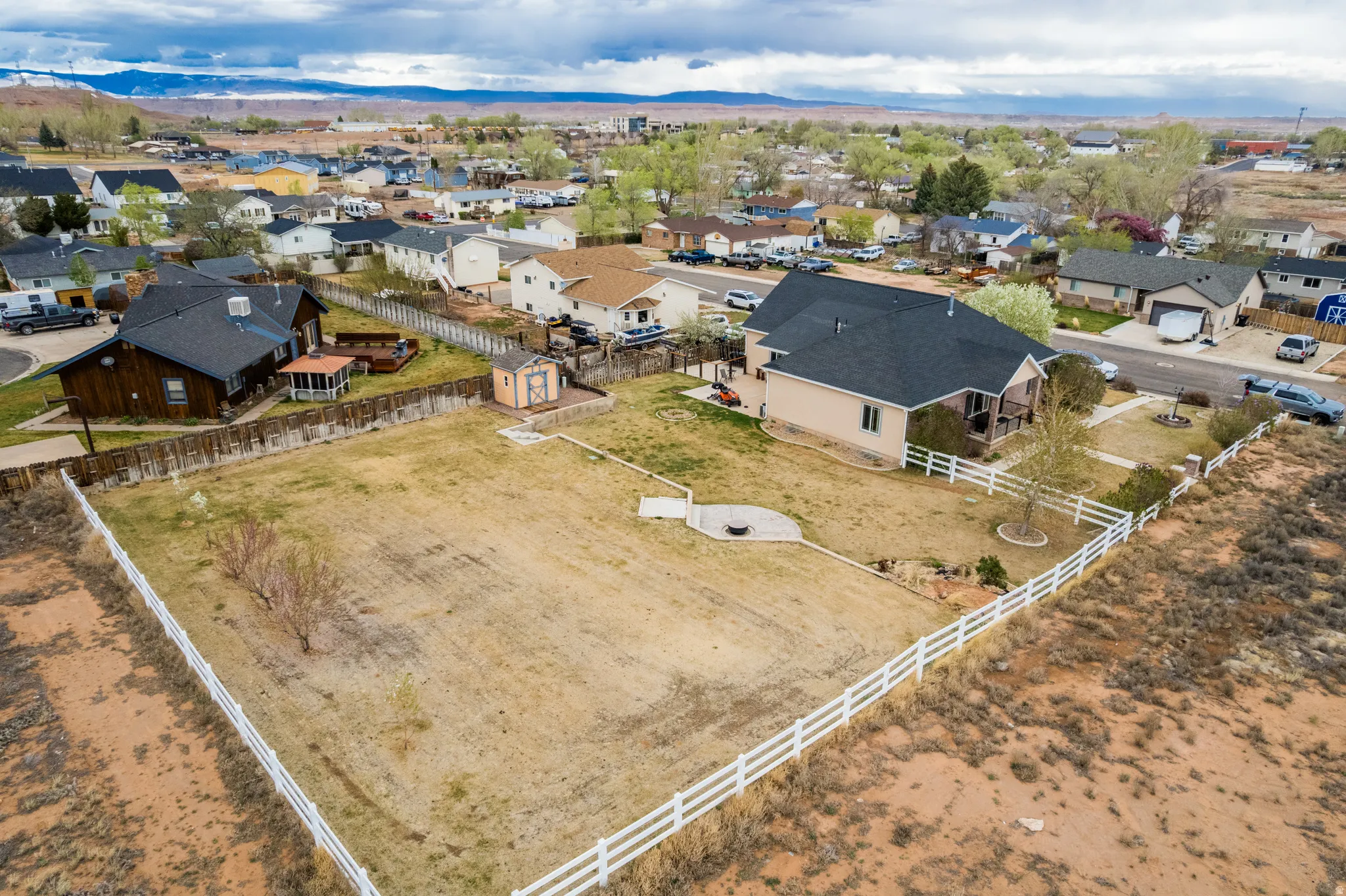 View of property location featuring nearby suburban area and a mountainous background