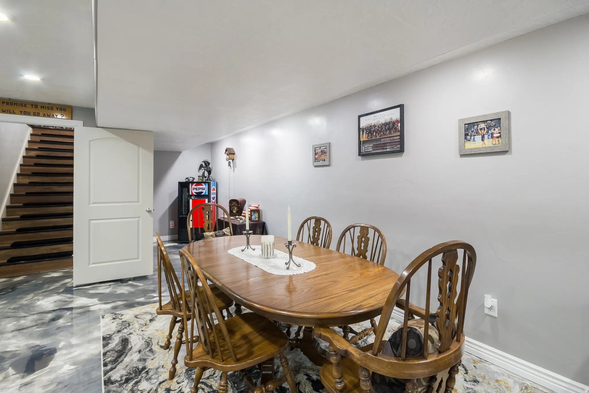 Dining space with stairs and recessed lighting