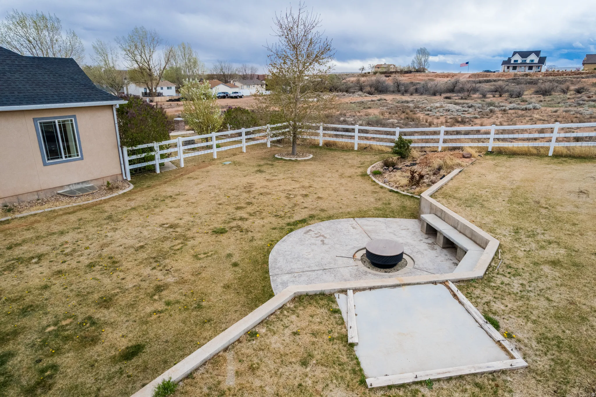 Fenced backyard featuring a patio area