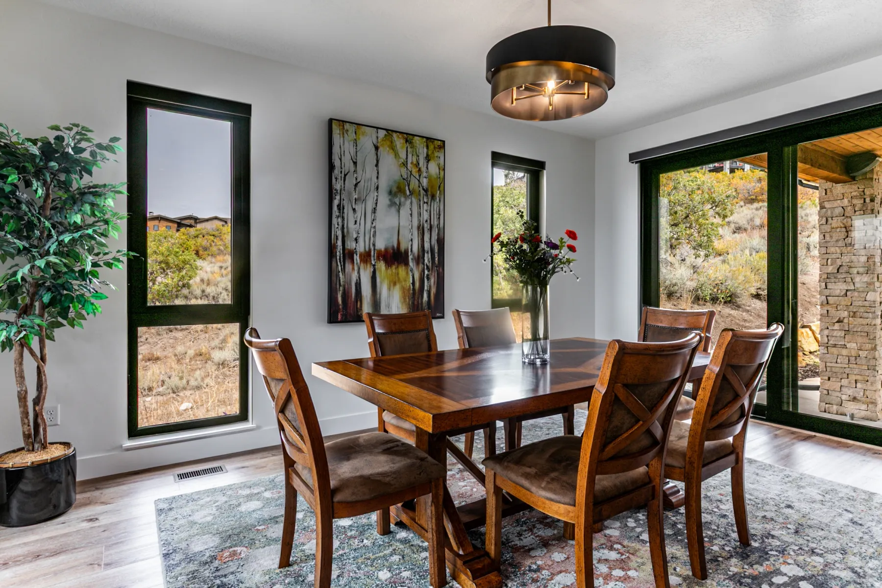 Dining space with wood finished floors
