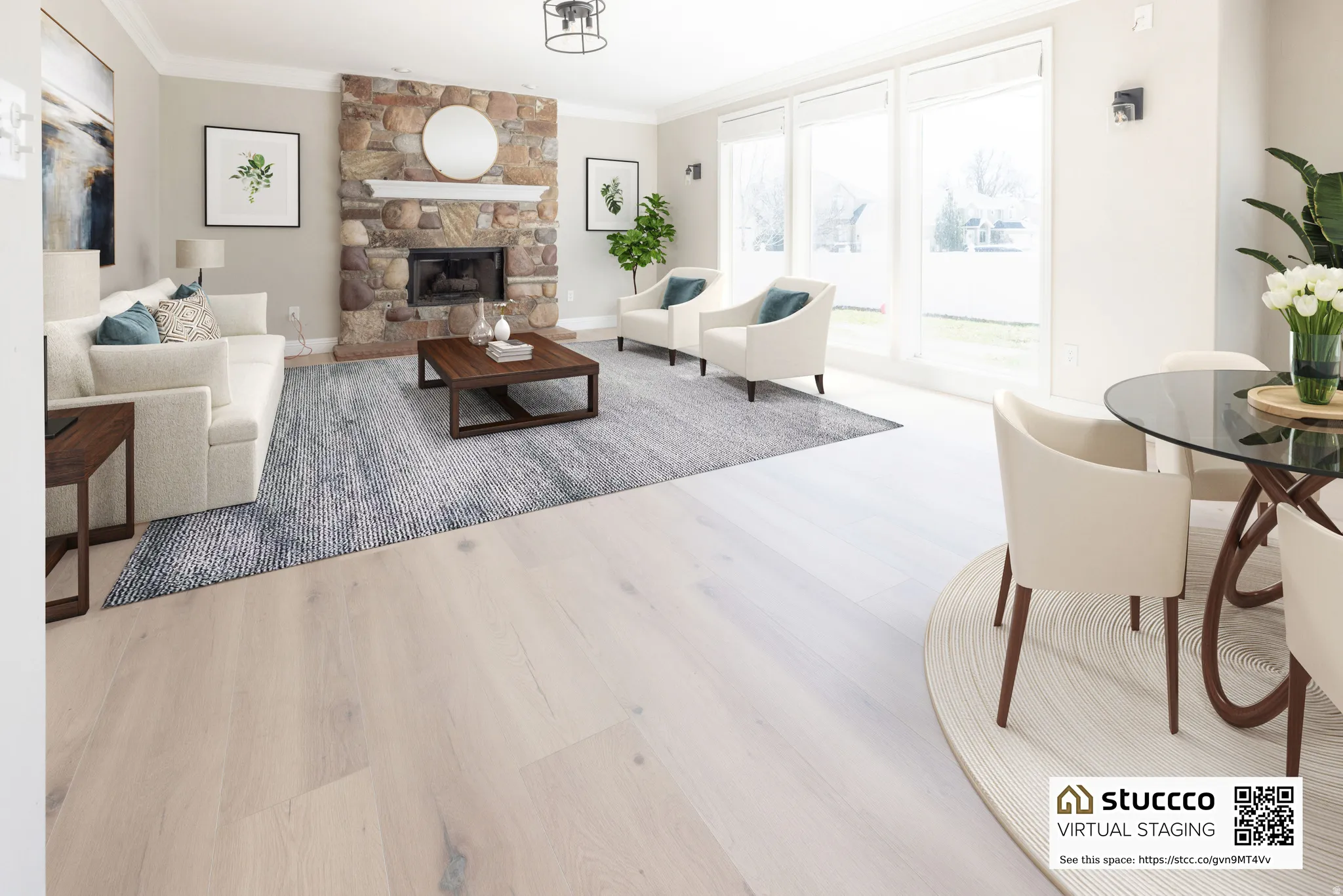 Living room with light wood-type flooring, crown molding, and a stone fireplace