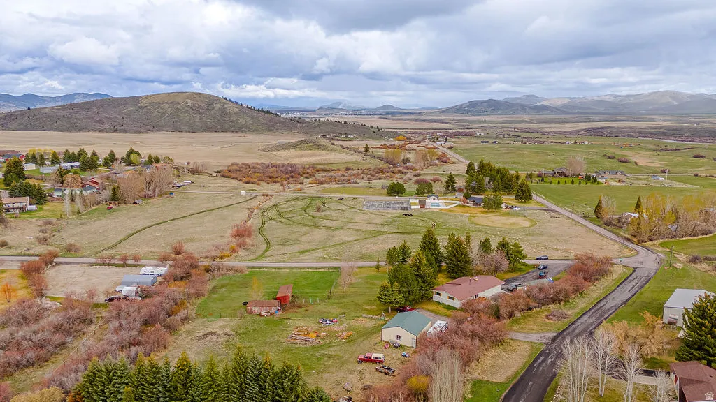Overview of rural landscape featuring a mountainous background