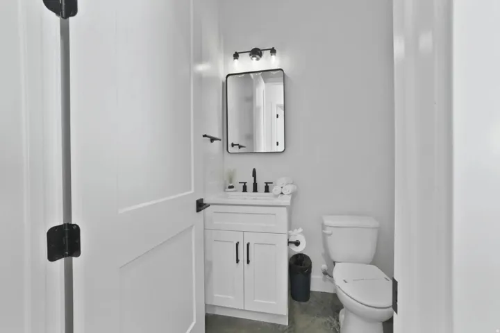 Bathroom with vanity and toilet