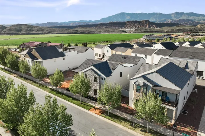 Aerial view of residential area with a mountain backdrop