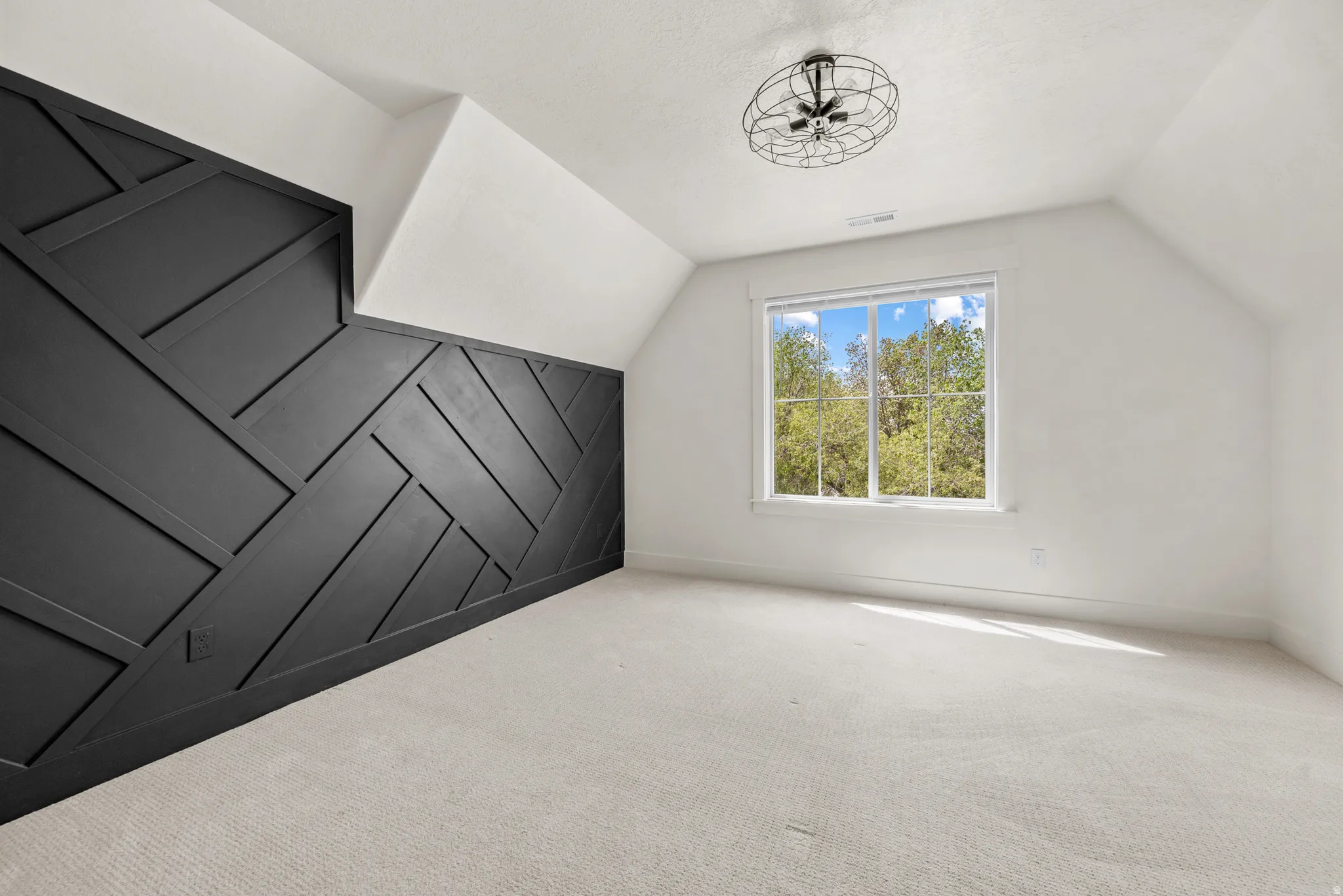 Bonus room with carpet flooring