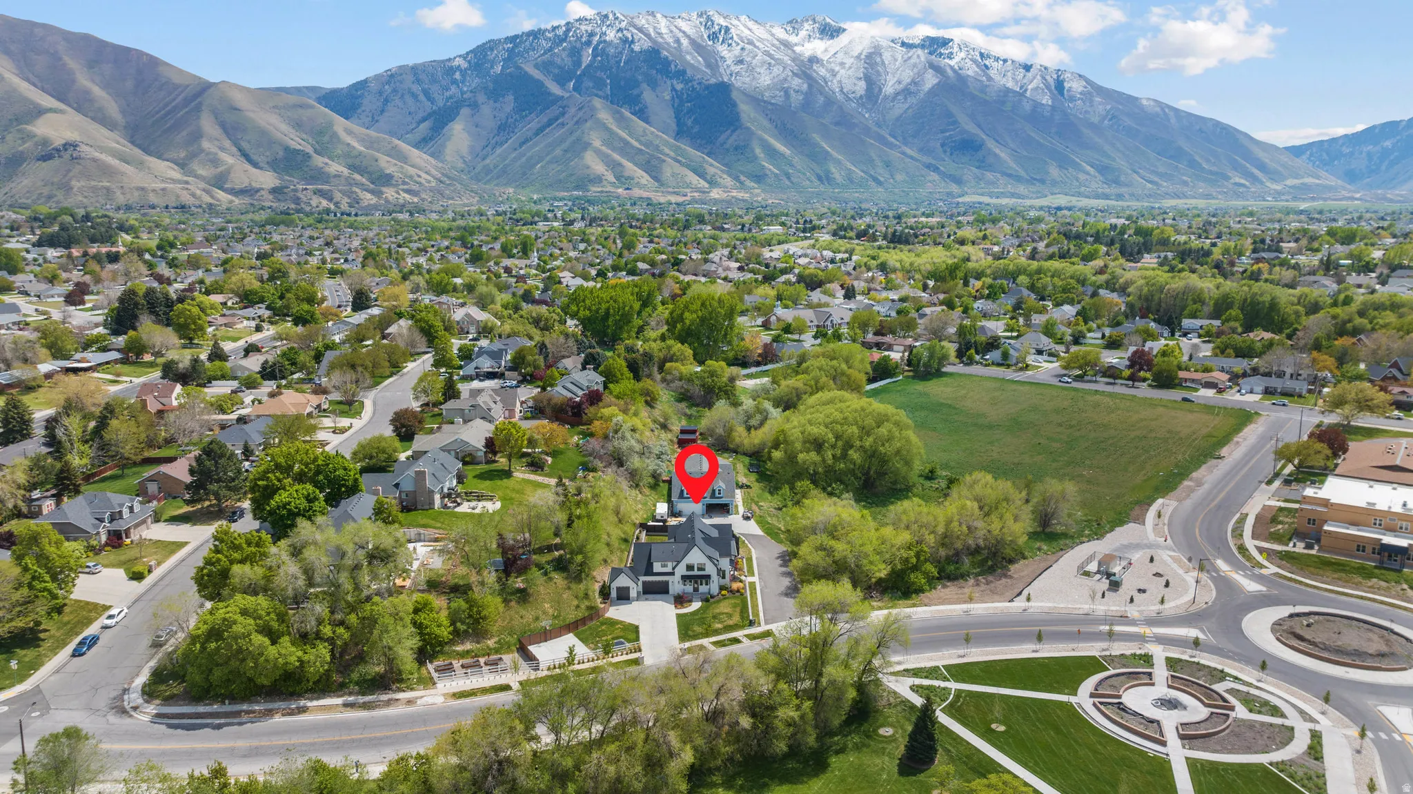 Aerial perspective of suburban area featuring mountains