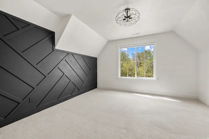Bonus room with carpet flooring