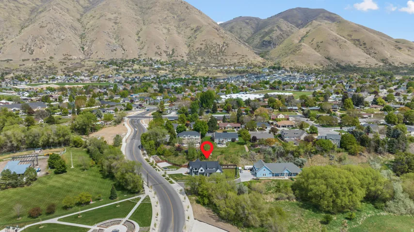 Aerial view of residential area featuring mountains