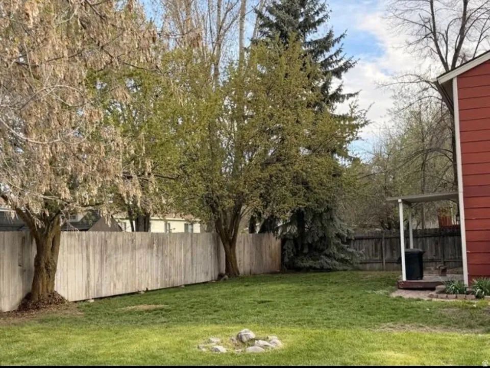 View of fenced backyard