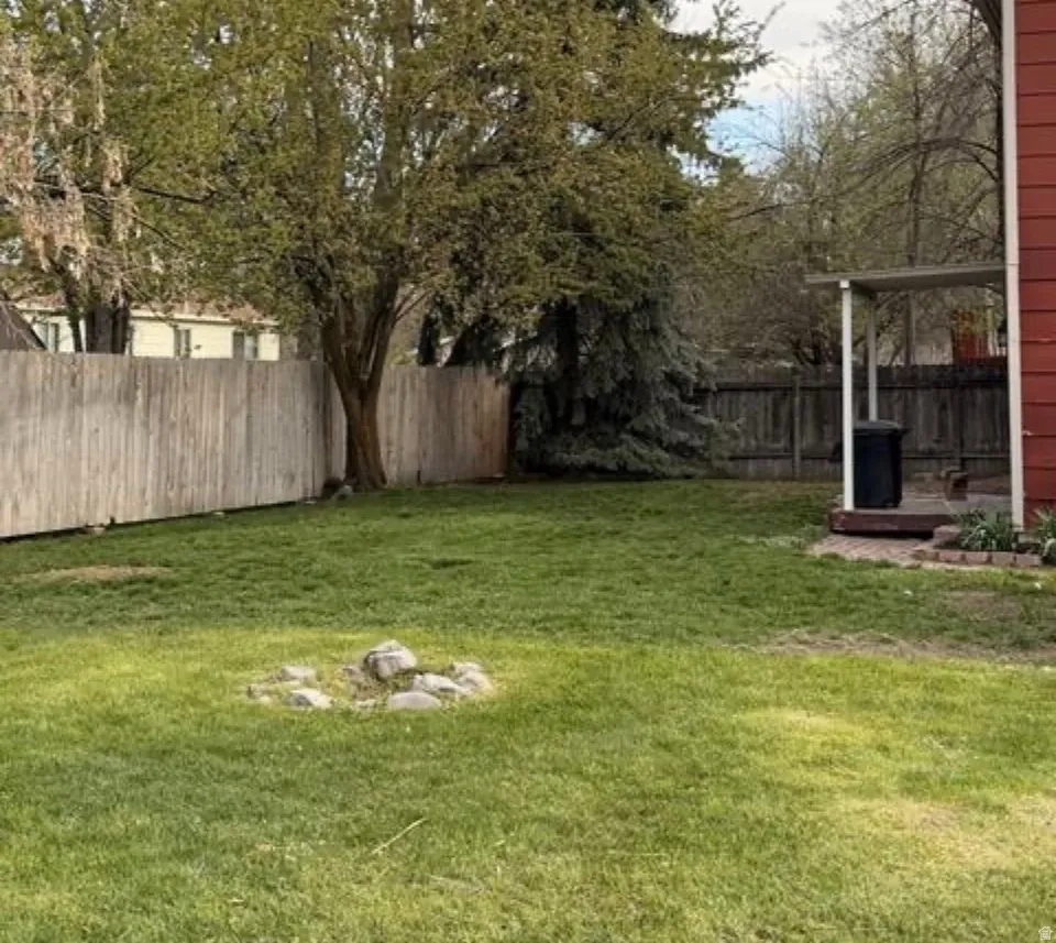 View of fenced backyard