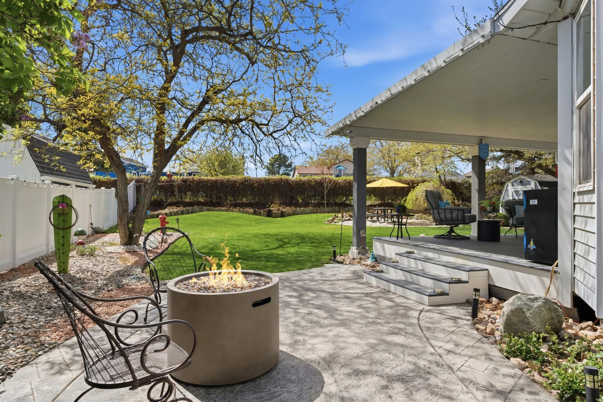 Fenced backyard featuring a patio