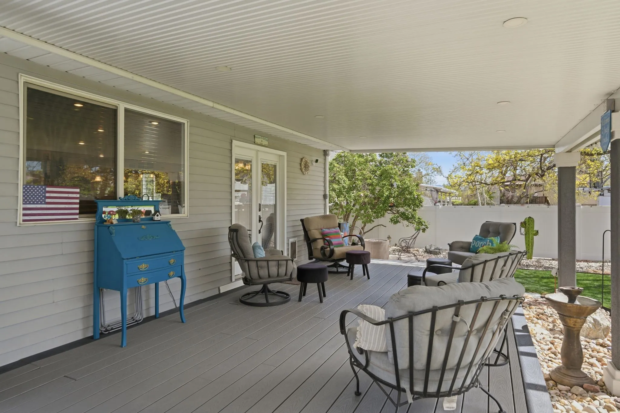 Deck featuring outdoor seating and french doors