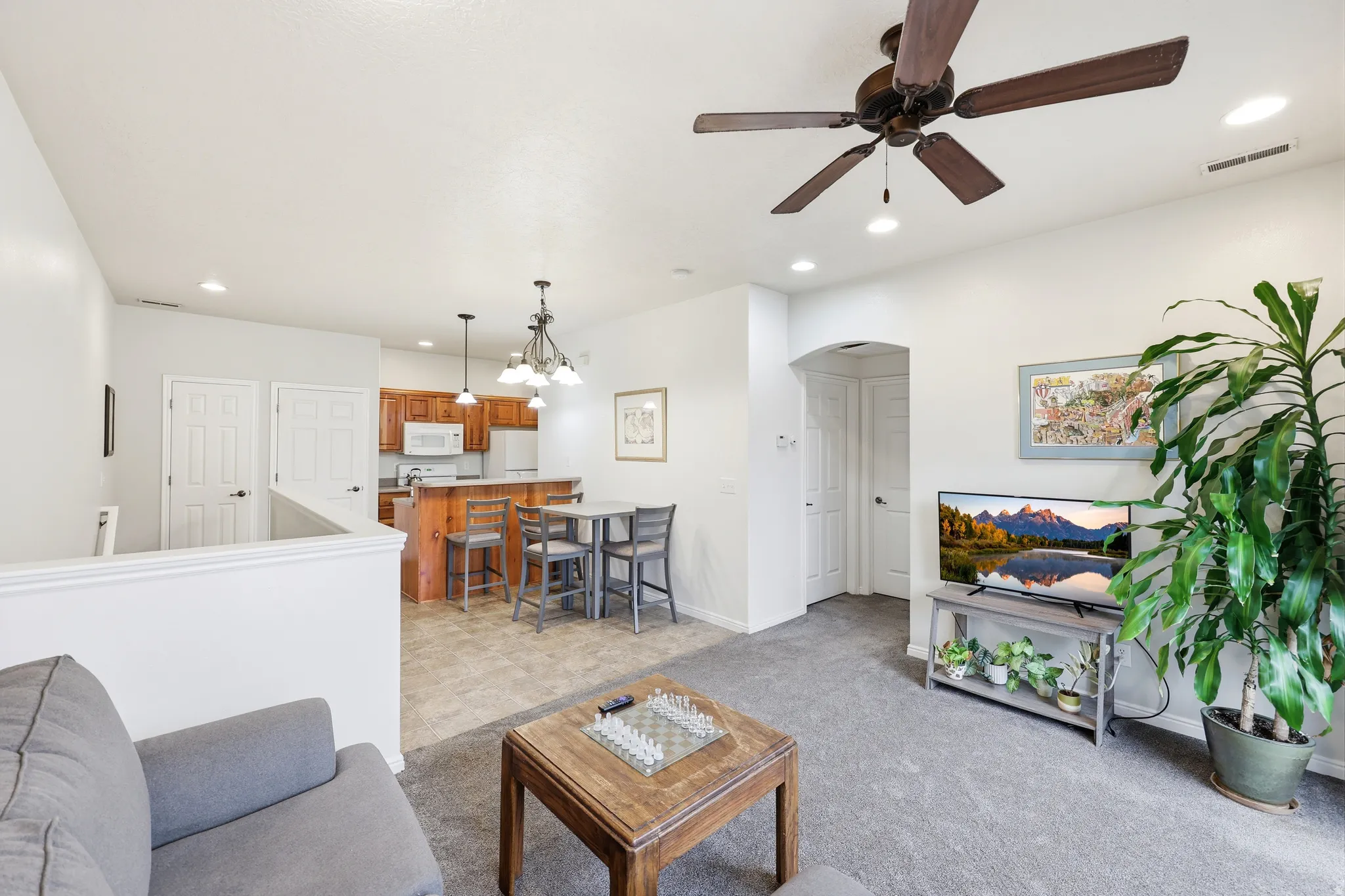 Living room open to kitchen and dining area