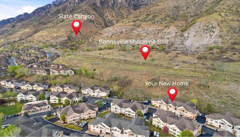 View of property location with nearby suburban area and a mountainous background