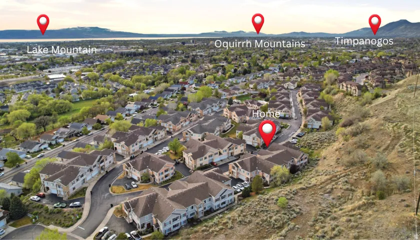 Aerial view at dusk of a mountain view and a residential view